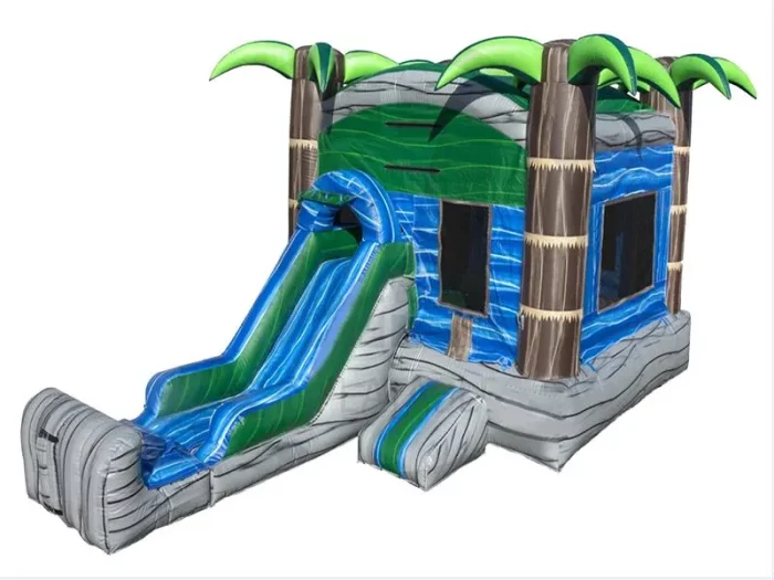 Tropical-themed bounce house with palm trees, attached water slide, and vibrant blue-green design. Perfect for summer events. Buy online today!