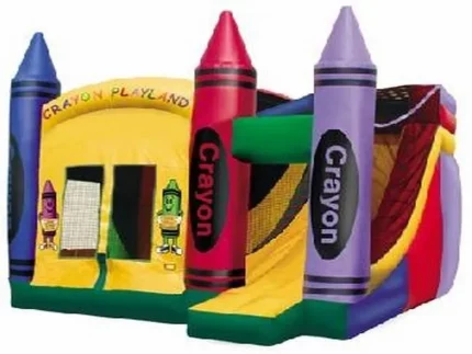 Crayon-themed bounce house with colorful pillars, slide, and "Crayon Playland" design. Perfect for kids' events. Buy this fun bounce house online today!