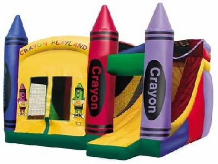 Crayon-themed bounce house with colorful pillars, slide, and "Crayon Playland" design. Perfect for kids' events. Buy this fun bounce house online today!