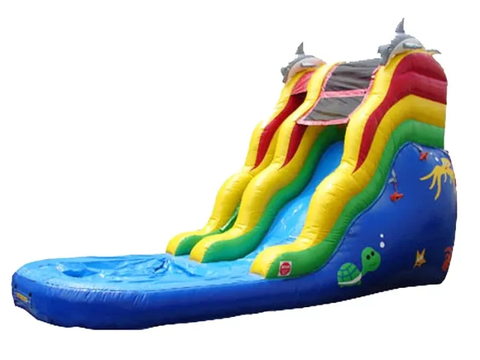 Ocean-themed inflatable water slide with bright colors, dolphin accents, and attached pool. Perfect for summer parties. Buy this fun slide online today!