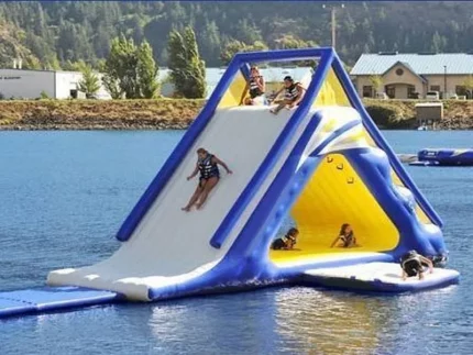 Inflatable water slide with climbing wall, perfect for lakes and summer fun. Durable, spacious, and high-quality. Buy online for ultimate water adventures!