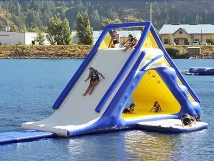 Inflatable water slide with climbing wall, perfect for lakes and summer fun. Durable, spacious, and high-quality. Buy online for ultimate water adventures!
