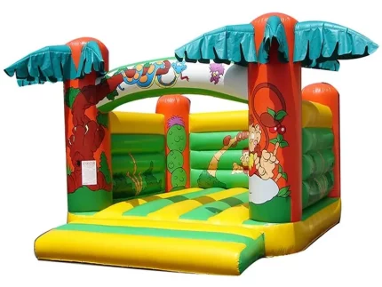 Jungle-themed inflatable bounce house with palm tree designs, vibrant colors, and spacious jumping area. Perfect for kids' parties. Buy online now!
