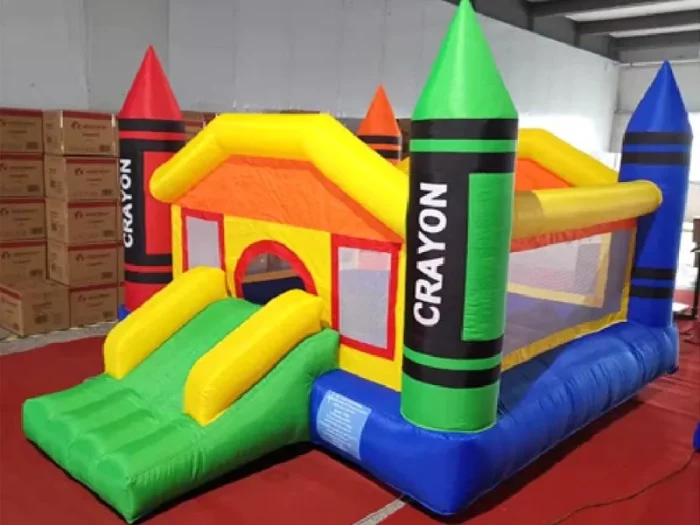 Crayon-themed bounce house with slide, perfect for kids' parties and events. Bright, durable, and fun. Buy affordable bounce houses online today!