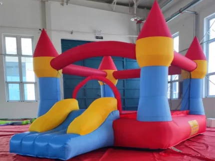 Castle-themed inflatable bounce house with slide, ideal for kids' parties. Bright colors, durable design, and easy setup. Buy online for affordable fun!