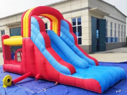 Colorful inflatable bounce house with dual slide and play area, perfect for kids' events. Durable, fun, and easy to set up. Buy online today!