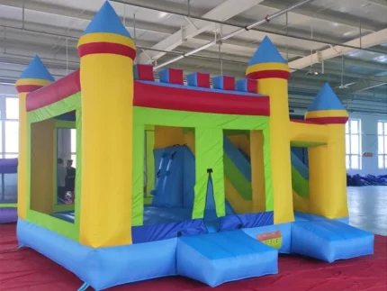 Large castle-themed inflatable bounce house with slide and climbing wall, perfect for parties. Bright, durable, and fun. Buy online for endless entertainment!