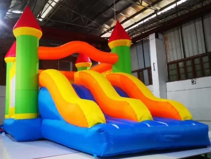 Bright inflatable bounce house with dual slides, castle design, and vibrant colors. Perfect for kids' events. Buy affordable, high-quality online.